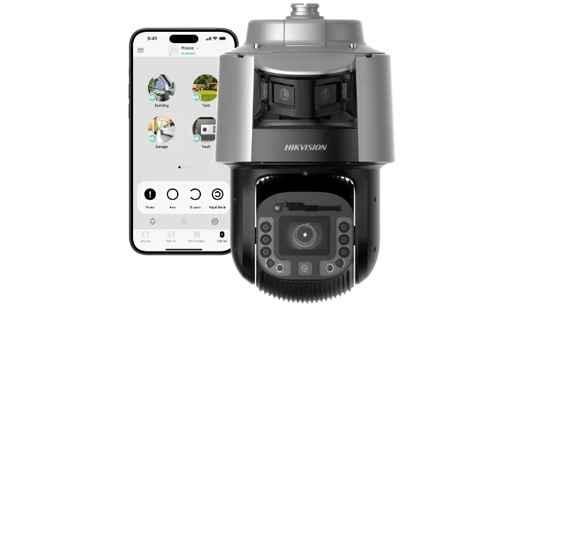 Kamera obrotowa Hikvision. Obok niej telefon z włączoną aplikacją do sterowania inteligentnym systemem smart home.