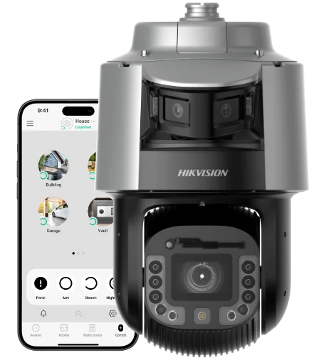 Kamera obrotowa Hikvision na tle iPhone'a z otwartą aplikacją alarmową Ajax Systems - integracja monitoringu i systemu alarmowego montaż Winkam Rybnik.